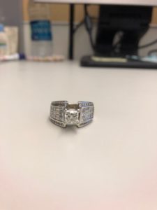 18KT W/G w/ 1.52CT Princess Cut diamond plus 2.36CT of princess cut, baguettes, and round diamonds